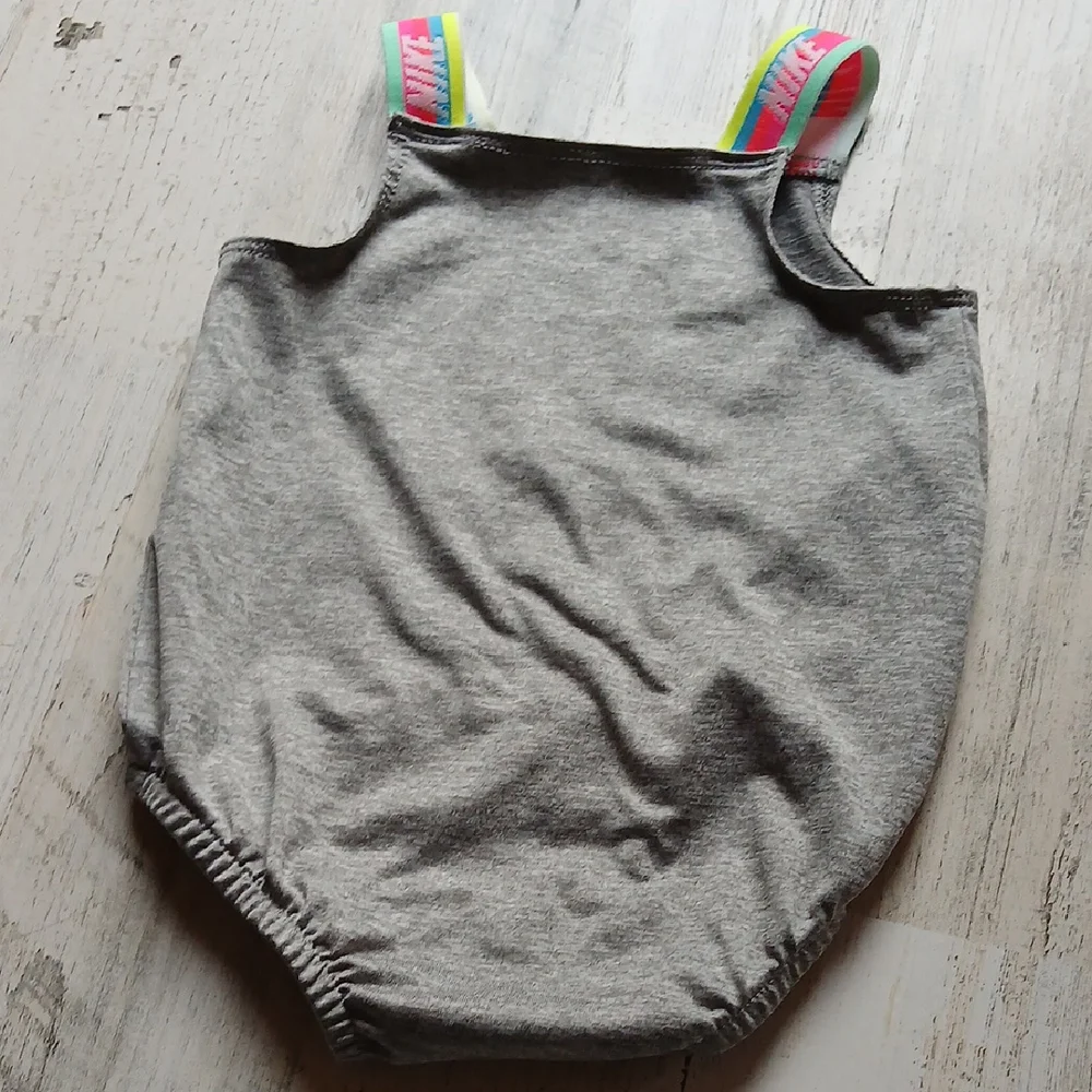 Nike Pink and Gray Diaper Cover with Vibrant Accents